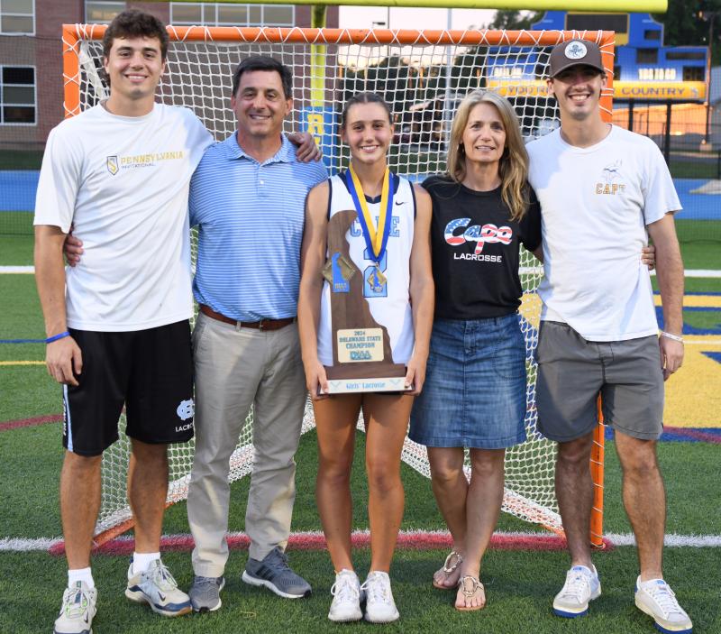 Lindsay D’Ambrogi holds the 2024 lacrosse state championship trophy.
Shown are Hank, Mark, Lindsay, Alicia and Luke.